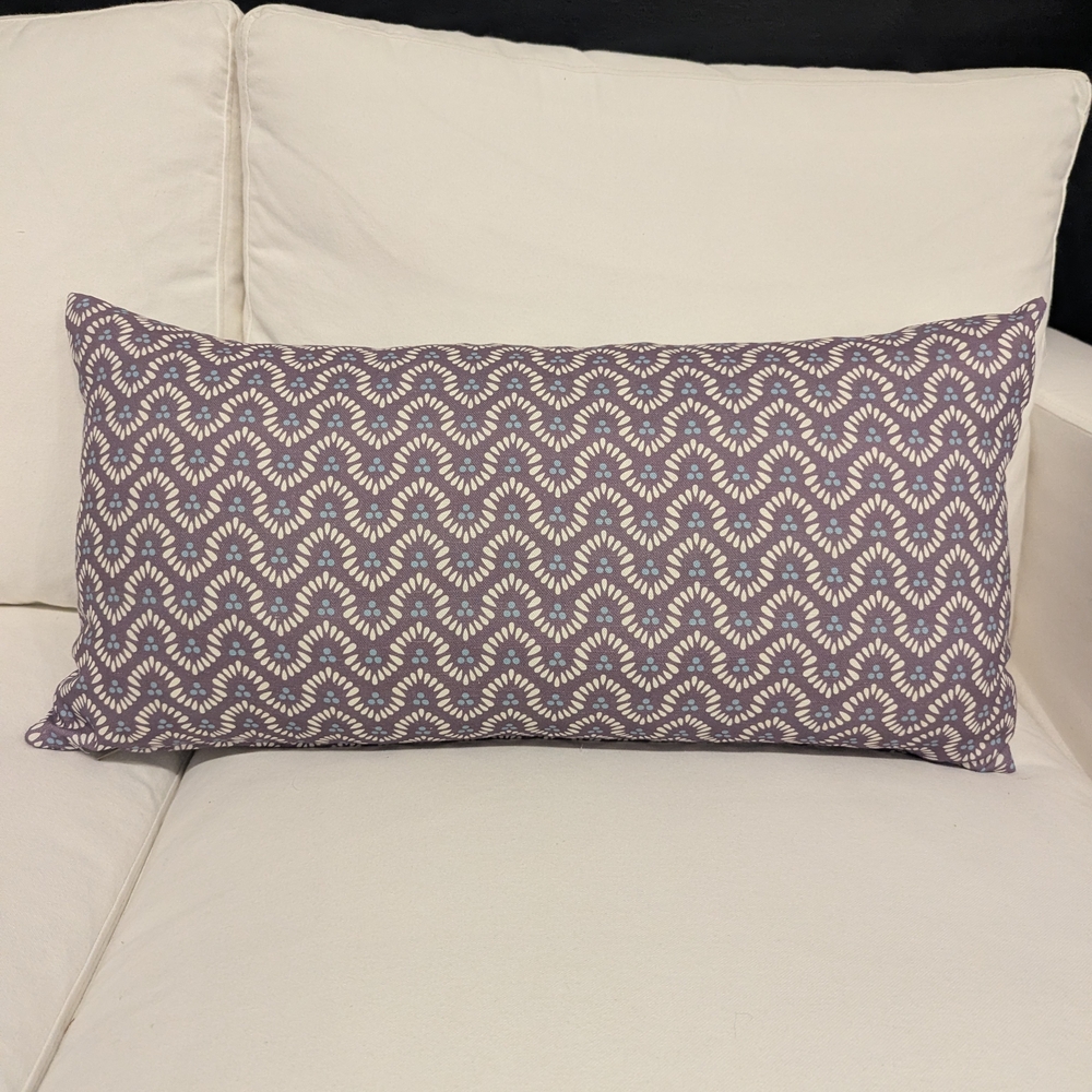 Purple and White Patterned Throw Pillow